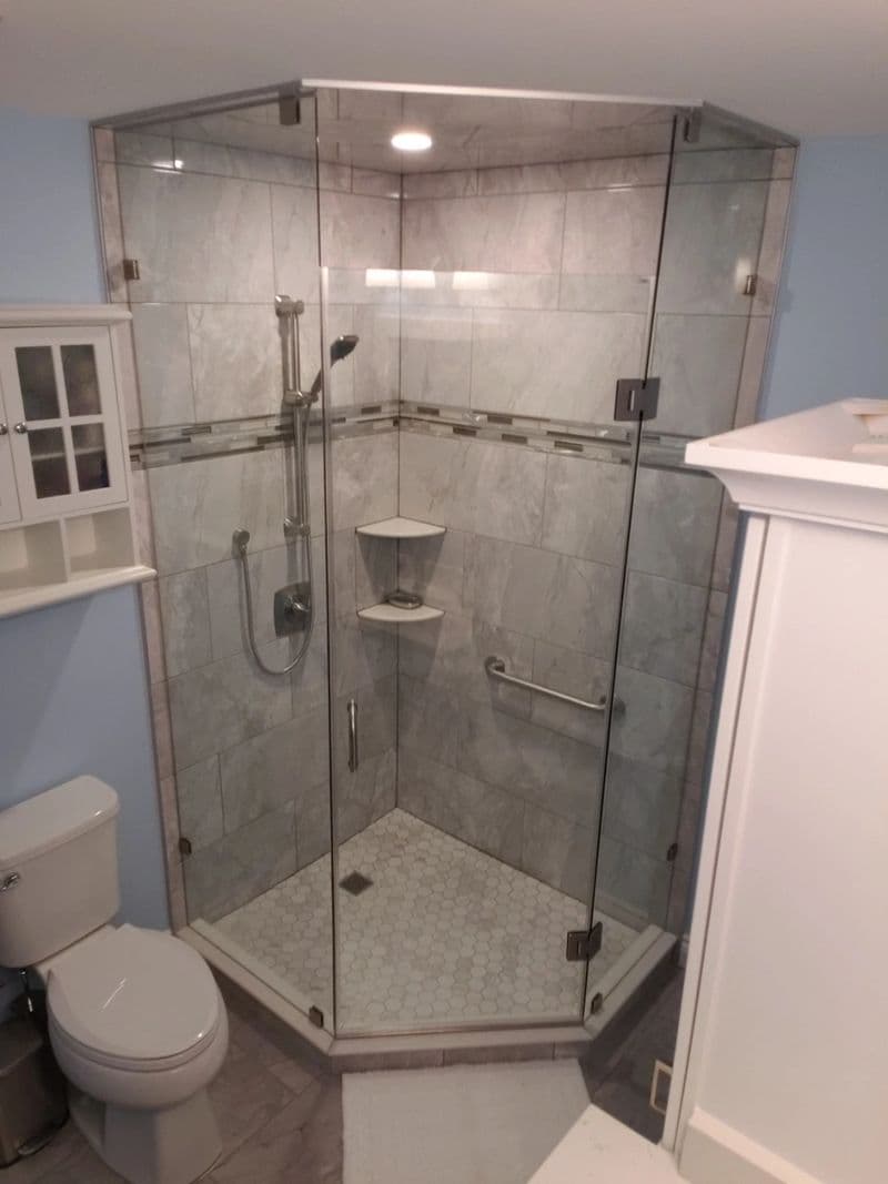 Bathroom renovation with updated tile and fixtures
