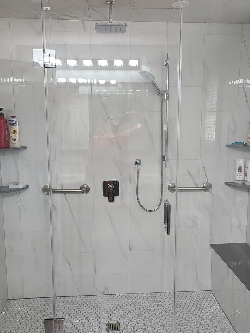 Bathroom interior with shower and enclosure