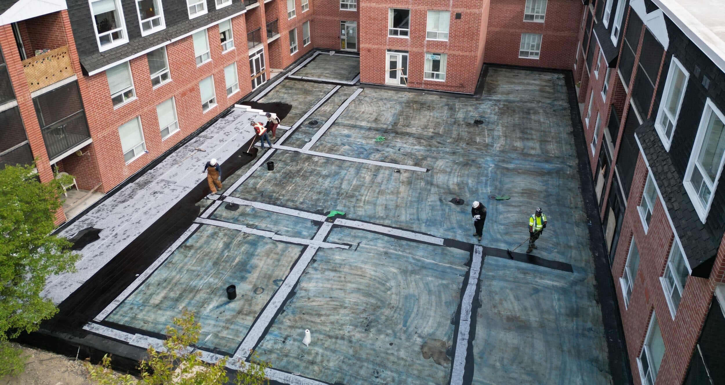 Building waterproofing and envelope work on a Toronto-area condominium