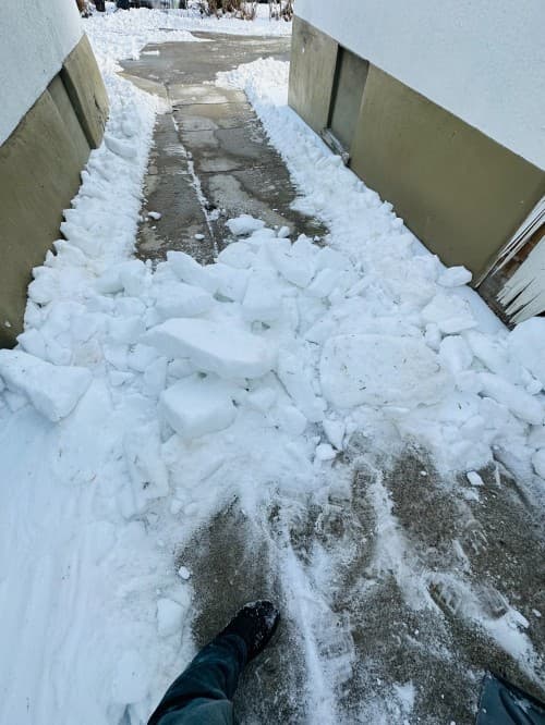 Walkway being cleared by AUI winter crew