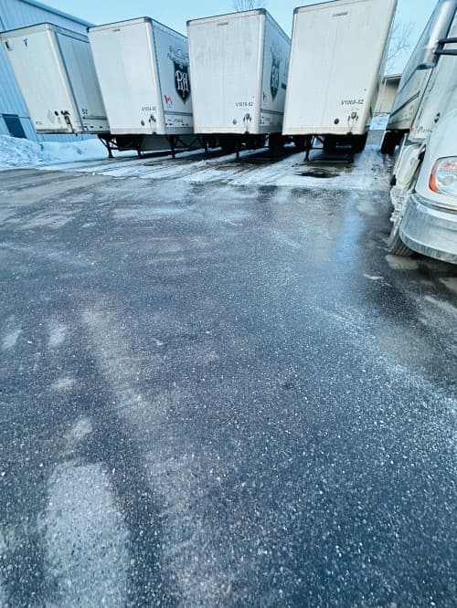 Transport trailer parking area after ice control treatment