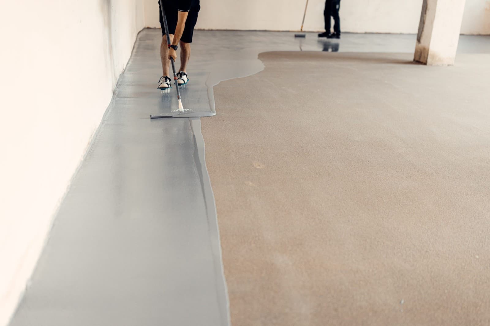 Freshly coated concrete floor with high-gloss epoxy finish